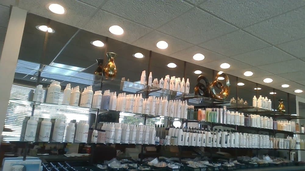 Akins Apollo Custom Hair Replacement - hair transplant in Oklahoma City, OK